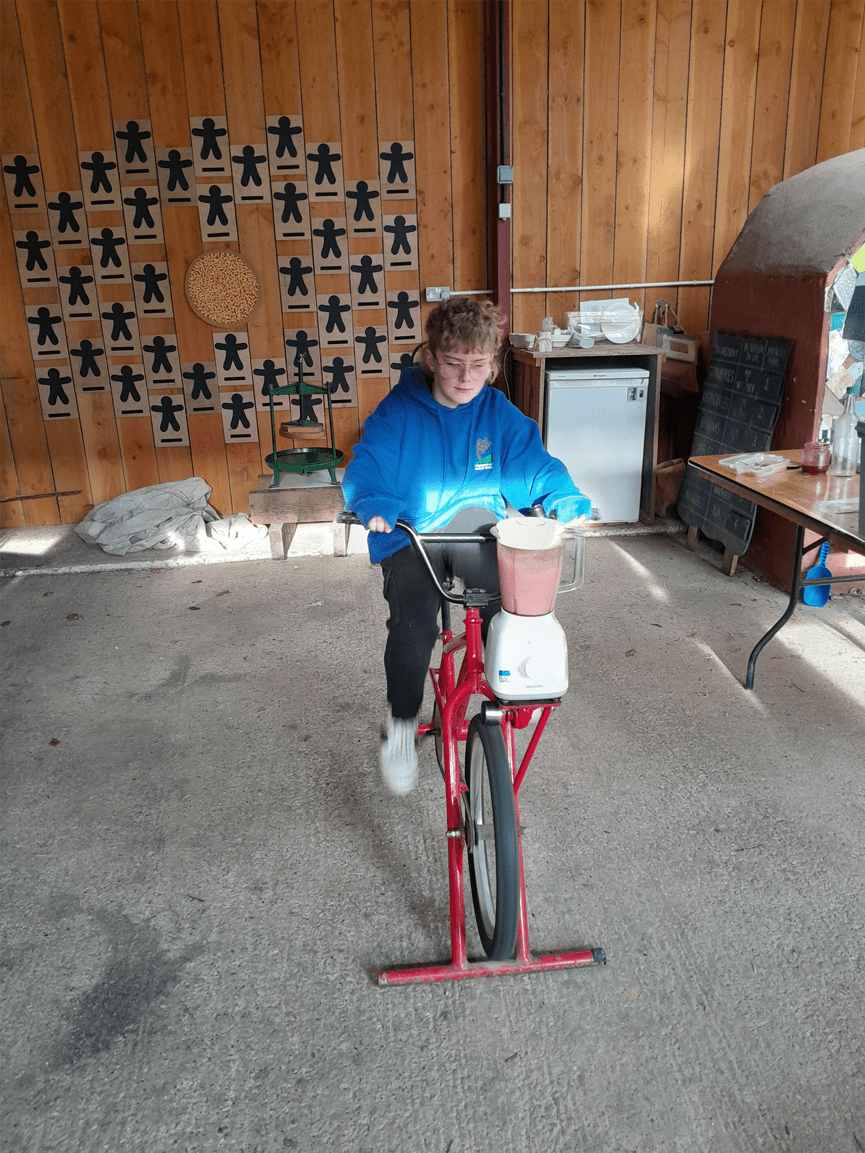 Pedal power in action: Stable School learners making smoothies on bicycles at Magdalen Farm.