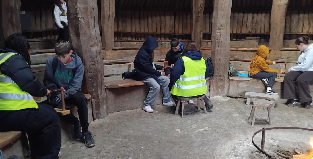 Stable School learners from Waikiki and Fistral classes taking part in hands-on historical activities at the Ancient Technology Centre in Cranborne, exploring ancient farming and building techniques.