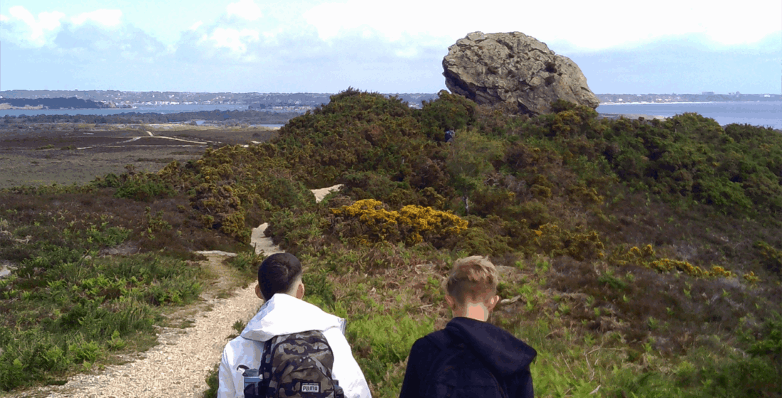 Year 9 and Year 10 learners from The Stable School visit Agglestone Rock in the Purbecks during an educational trip exploring Dorset’s natural landmarks and coastline.