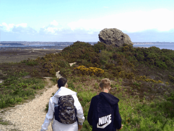 Year 9 and Year 10 learners from The Stable School visit Agglestone Rock in the Purbecks during an educational trip exploring Dorset’s natural landmarks and coastline.