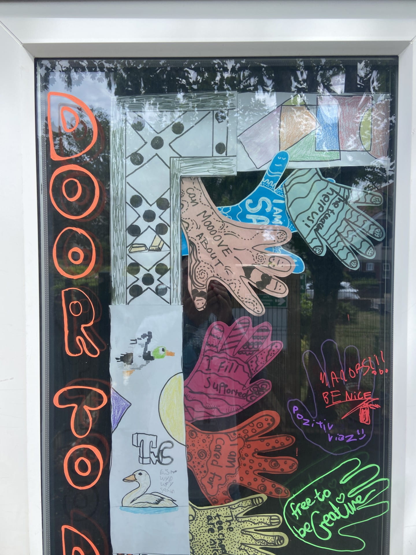 Learners at The Stable School create a vibrant 'Doorway to Difference' display, celebrating equality, diversity and inclusion through collaborative artwork.